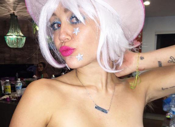 Miley Cyrus cowgirl in topless