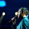 Marco Mengoni che canta ad un suo concerto nel 2013