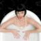 Katy Perry nella vasca da bagno con caschetto nero e unghie rosse