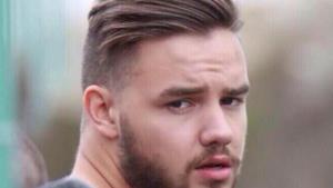 Liam Payne con barba e guance piene