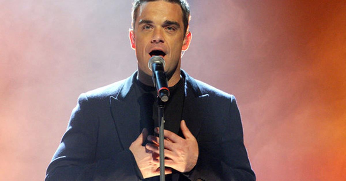 Певцы поют песню жить. Робби Уильямс. Робби Уильямс фото. Robbie Williams Concert 2022. Robbie Williams Concert.