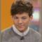 Louis Tomlinson elegante con un maglione grigio