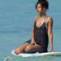 Beautiful Rihanna surfing
