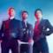 Take That: i tre membri rimasti Gary Barlow, Howard Donald e Mark Owen