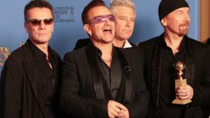 Membri degli U2 con il Golden Globe 2014 in mano