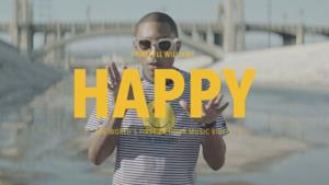 Un fotogramma con Pharrell dal video di Happy