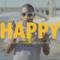 Un fotogramma con Pharrell dal video di Happy