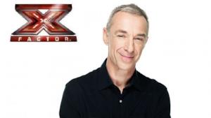 Linus con il logo di X Factor