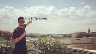 Afrojack vittima di Photoshop: il DJ indica la Tour Eiffel, ma semplicemente la scritta