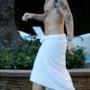 Harry solo con un asciugamano addosso
