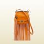 Gucci presenta una collezione primavera-estate 2014 con borse dal taglio hippy e boho chic