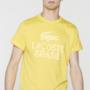 La t-shirt gialla di Lacoste per i Mondiali di Calcio 2014 della linea Rio