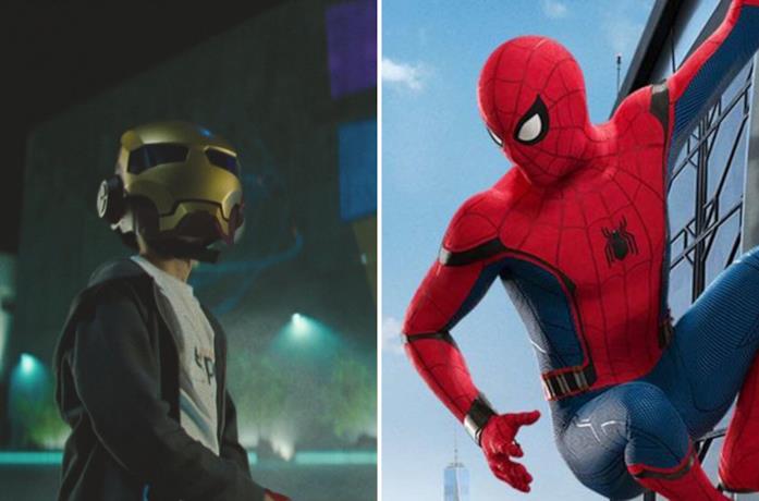 A sinistra il bambino con la maschera di Iron Man e a destra Spider-Man