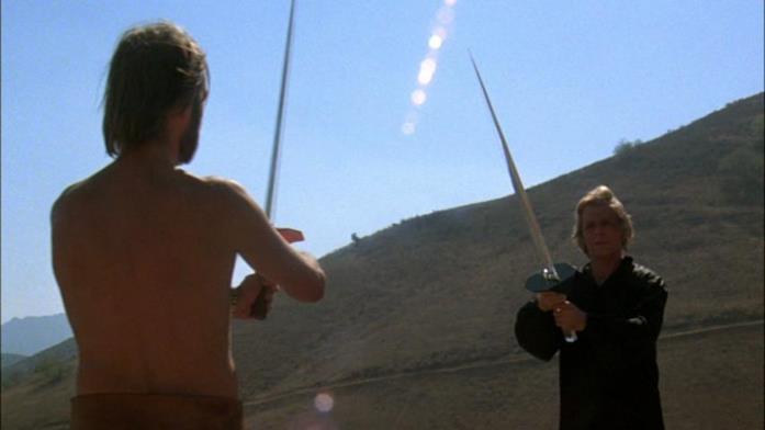 Una scena di I gladiatori degli anni 3000 David Carradine e Richard Lynch
