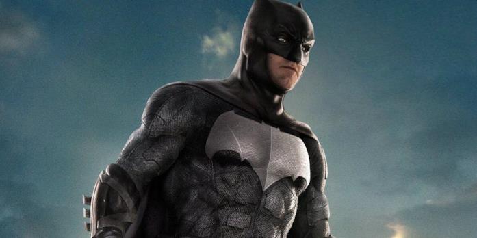 Un primo piano di Batman nel poster di Justice League