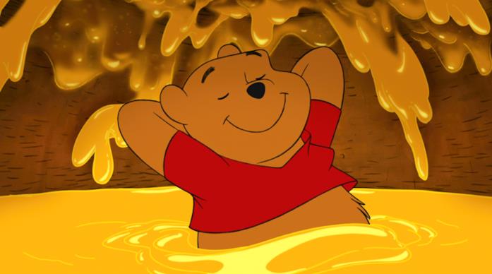 Winnie the Pooh Winnie the Pooh immerso nel miele
