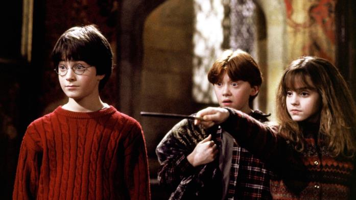 Harry Potter, Hermione Granger e Ron Weasley ne La Pietra Filosofale Daniel Radcliffe, Emma Watson e Rupert Grint ne La Pietra Filosofale