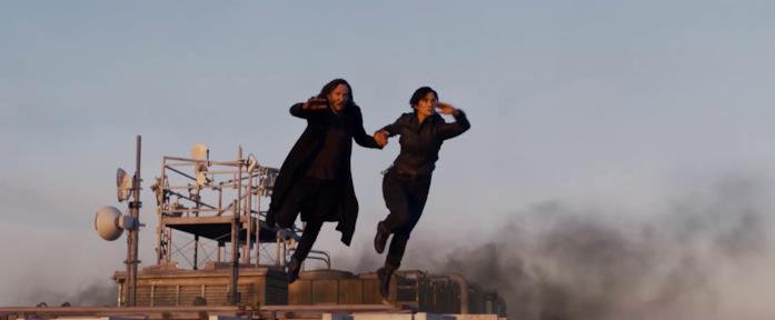 Matrix 4: le incredibili scene d'azione nel trailer ufficiale Neo e Trinity saltano da un palazzo