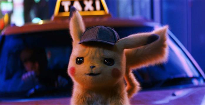 Pikachu Pikachu appoggiato a un Taxi