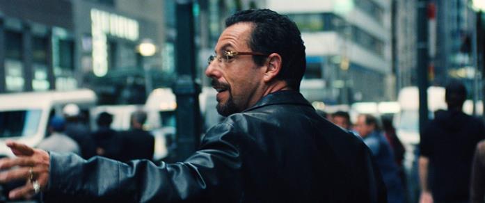 Non solo Venezia 76: a Telluride, Renée Zellweger e Adam Driver da Oscar Adam Sandler in una scena del film Uncut Gems