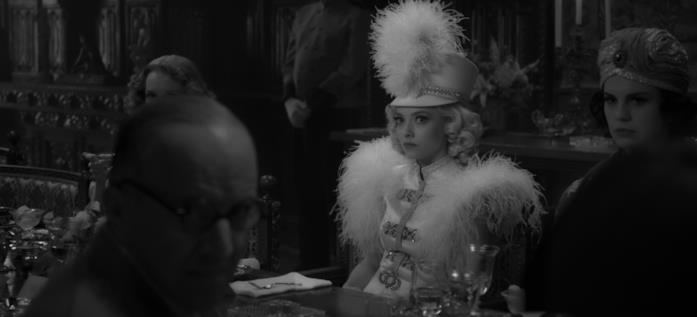 Mank Marion Davies assiste allo scontro tra l'amico e l'amante