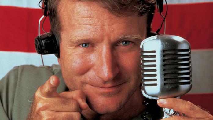 Robin Williams è stato il protagonista di Good Morning, Vietnam Un'immagine promozionale con Robin Williams del film Good Morning, Vietnam