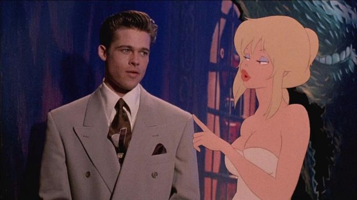 Holli Would e Brad Pitt Holli Woyld parla con Brad Pitt nel Mondo Furbo in una scena di Fuga dal mondo dei sogni