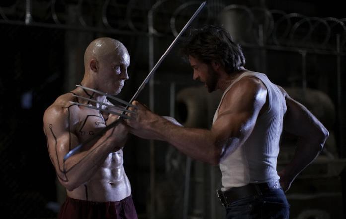 X-Men le origini: Wolverine Ryan Reynolds e Hugh Jackman in una scena di X-Men le origini: Wolverine