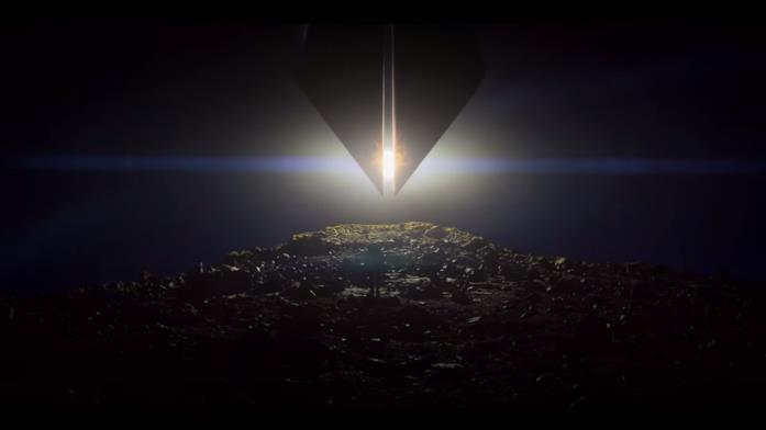 Foundation di Apple TV+, ecco il trailer Una persona nel buio guarda il sole coperto da una astronave