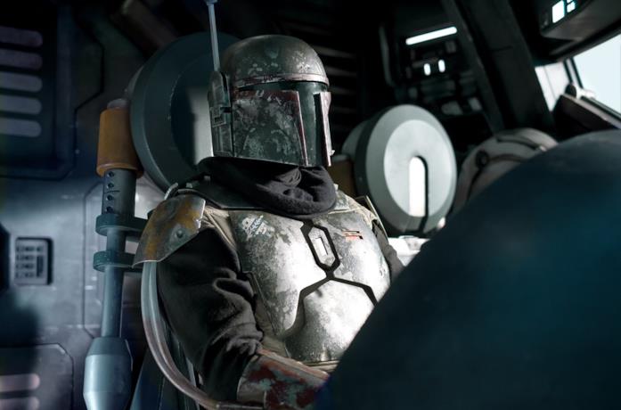 Temura Morrison indossa l'armatura di Boba Fett in una scena della serie The Mandalorian