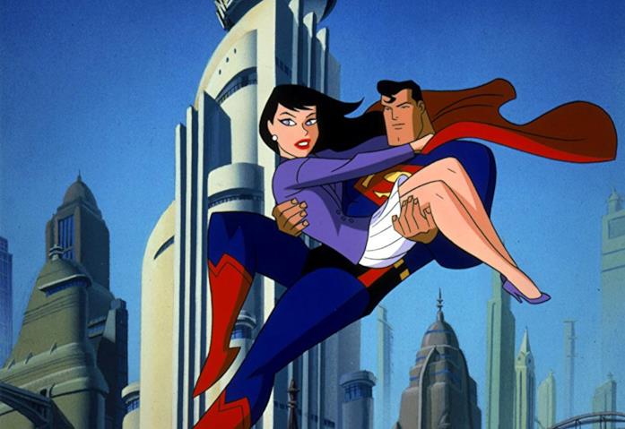 La nuova serie animata di Superman del 1996 è un enorme successo Superman porta in braccio in volo Lois Lane, sullo sfondo di Metropolis