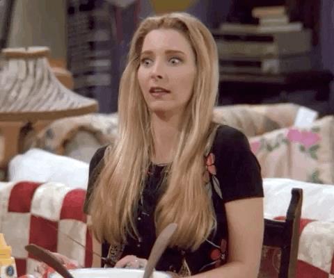 Phoebe di Friends che fa spallucce Phoebe della serie TV Friends che fa spallucce