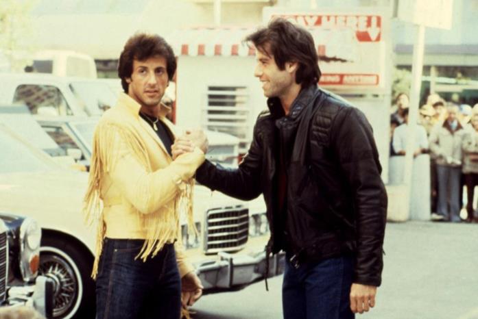 Sylvester Stallone e John Travolta sul set di Staying alive Stallone e Travolta, rispettivamente regista e protagonista di Staying alive