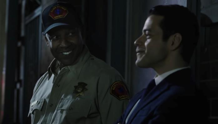 Deke Deacon e Jimmy Baxter in una scena di Fino all'ultimo indizio Denzel Washington e Rami Malek in una scena di Fino all'ultimo indizio
