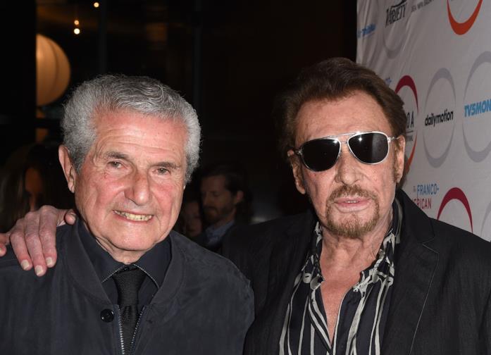 Claude Lelouch e Claude Lelouch e Johnny Hallyday durante la presentazione del film Parliamo delle mie donne