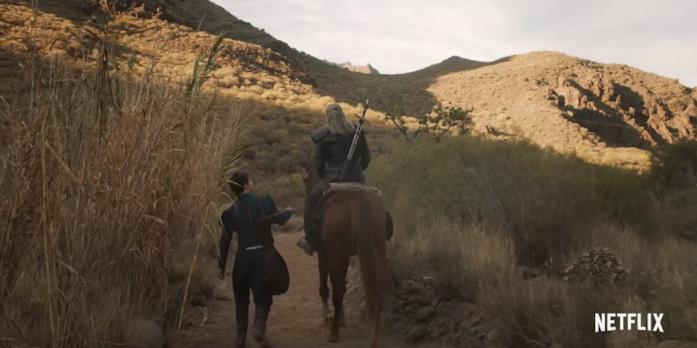 Ranuncolo e Geralt sulla serie tv Il bardo Ranuncolo che accompagna il witcher Geralt
