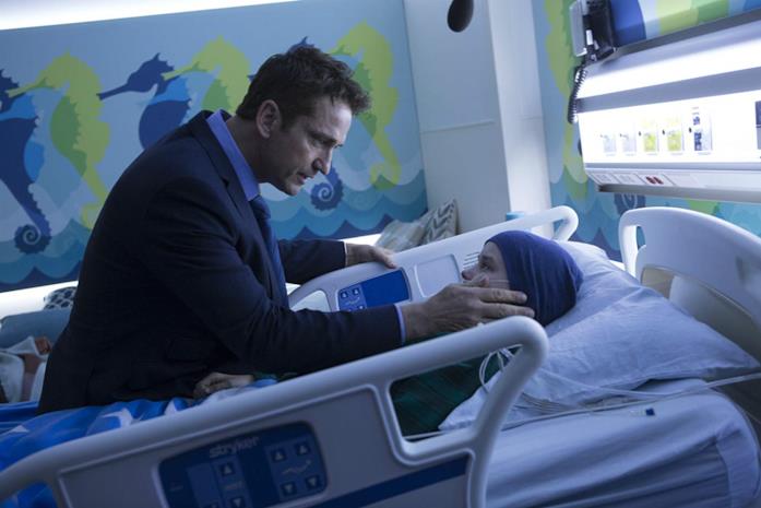 Dane Jensen e suo figlio Ryan, malato di leucemia Gerard Butler e Maxwell Jenkins in Quando un padre