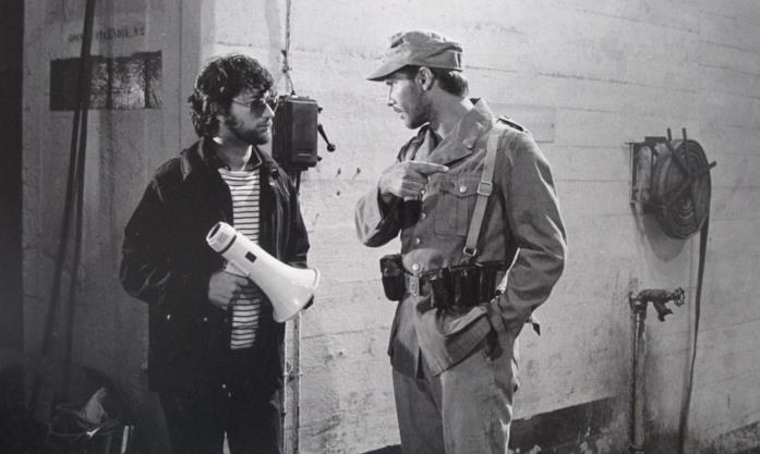 I predatori dell'arca perduta, la definitiva consacrazione di Spielberg Steven Spielberg e Harrison Ford sul set del film