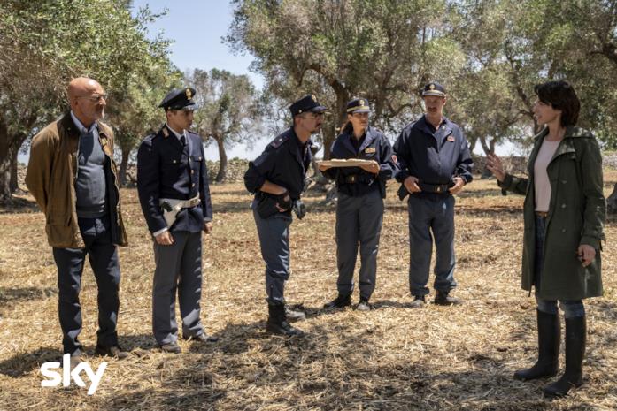 Una scena tratta dal film Cops - Una banda di poliziotti I poliziotti di Apulia stanno organizzando un piano