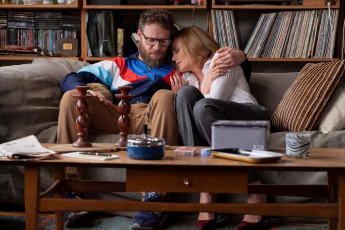 Una scena di Non succede... ma se succede Seth Rogen e Charlize Theron