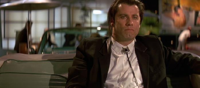 Pulp Fiction - Vincent Vega Vincent Vega in una scena di Pulp Fiction
