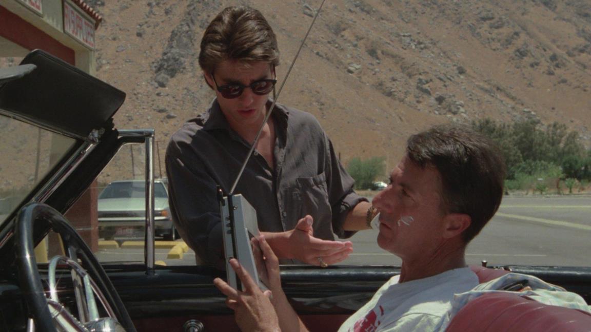 Una scena da Rain Man con Tom Cruise