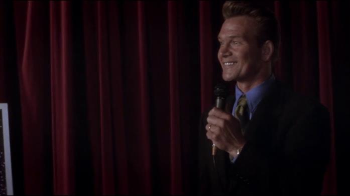 Il predicatore Jim Cunningham in una scena del film Patrick Swayze interpreta il predicatore Jim Cunningham