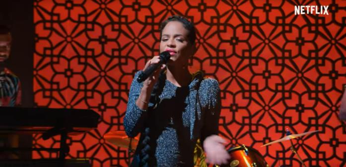 Christina Milian è la cantante Erica Christina Milian mentre canta in Resort to Love