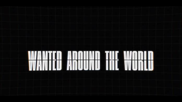 Un frame estrapolato dal trailer di World's Most Wanted La frase "Wanted around the world" sopra una sfondo nero