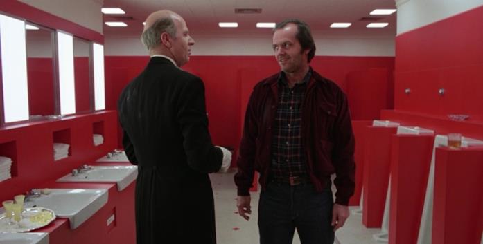 Jack Torrance e Delbert Grady discutono in un bagno della Gold Room Jack Torrance e Delbert Grady discutono in un bagno della Gold Room