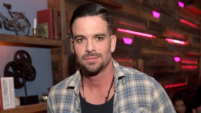 Mark Salling in una vecchia immagine che lo ritrae in una occasione ufficiale