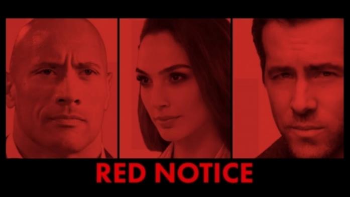 I primi piani di The Rock, Gal Gadot e Ryan Reynolds