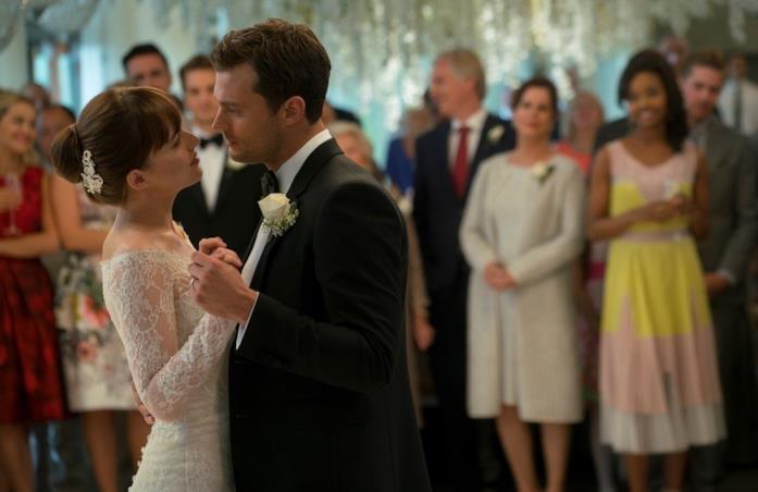 Dakota Johnson e Jamie Dornan Dakota Johnson e Jamie Dornan ballano durante il matrimonio