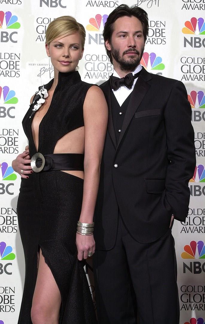 Charlize Theron con Keanu Reeves Charlize Theron con Keanu Reeves